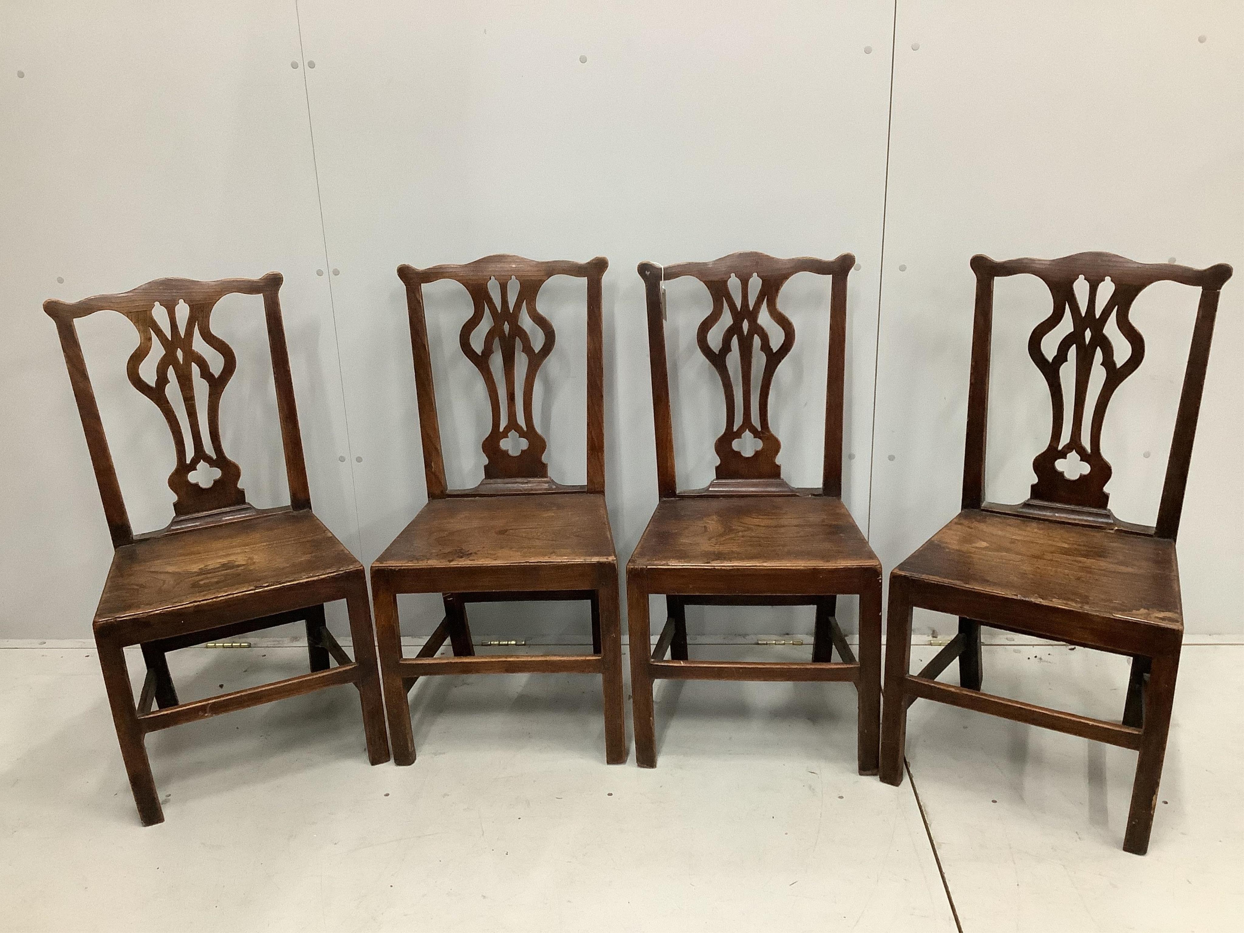 A set of four George III oak cottage dining chairs. Condition - poor